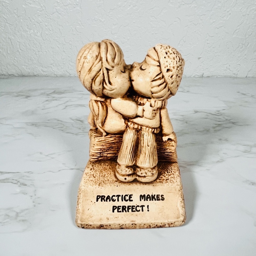 Vintage "Practice Makes Perfect" Figurine